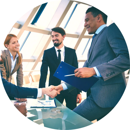 diverse group of business professionals smiling and shaking hands