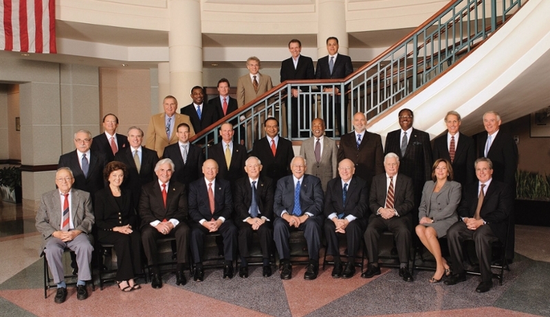 board of trustees posing in the lobby
