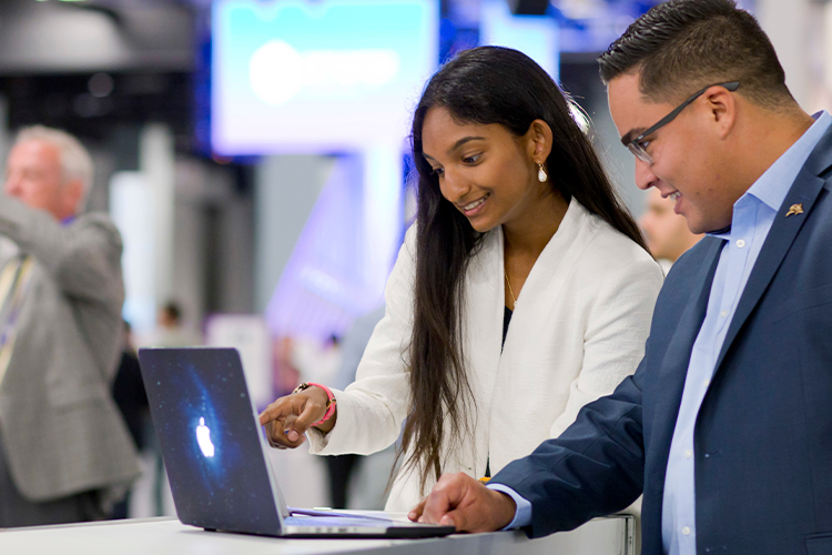 Suit attire men helping client with papers