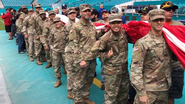 rotc team holding flag