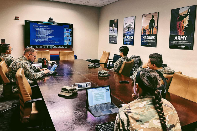 rotc students at the class looking at presentation