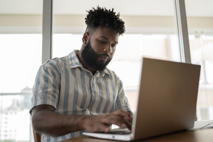 Student concentrated using computer
