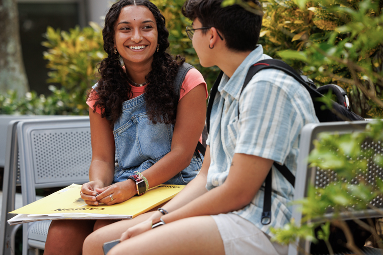 Two students having a conversation