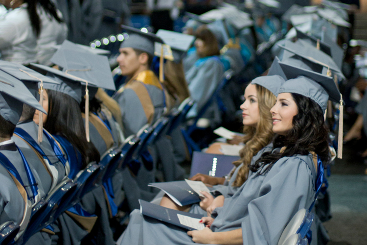 Graduates sitting at commencement