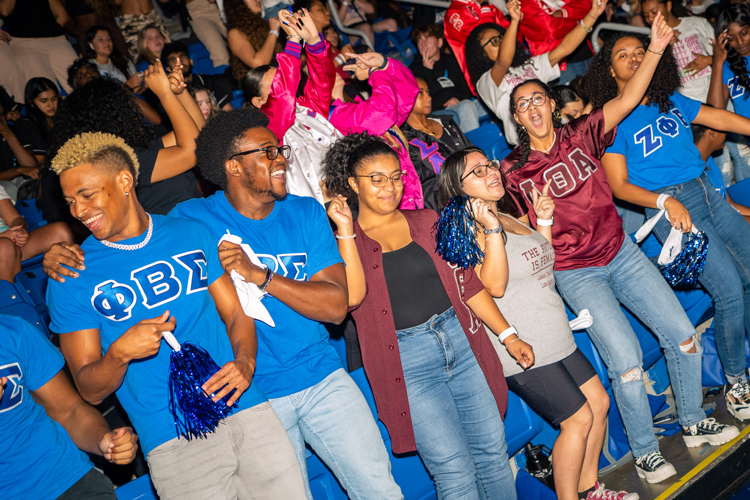 Homecoming pep rally students celebrating