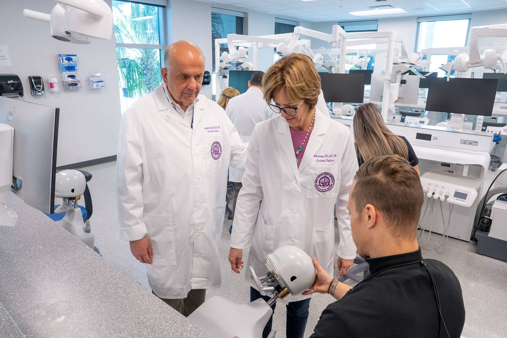 Faculty member with student