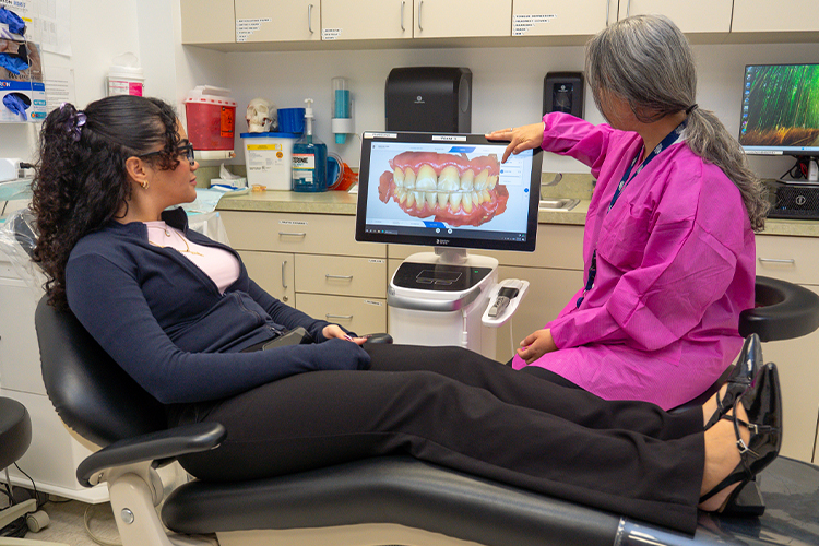 Dentist with her patient