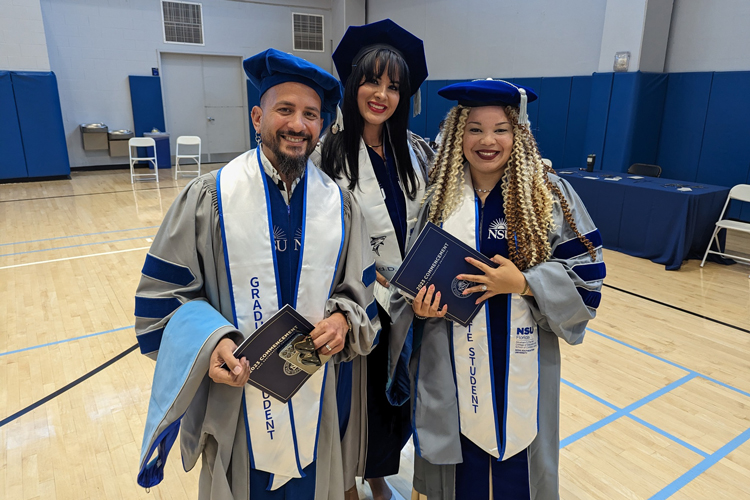 Fischler college commencement day group of graduates