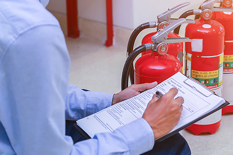 Reporting incident on fire safety log closeup