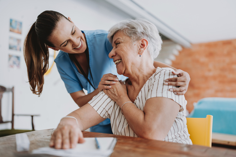 Senior patient with home healthcare professional