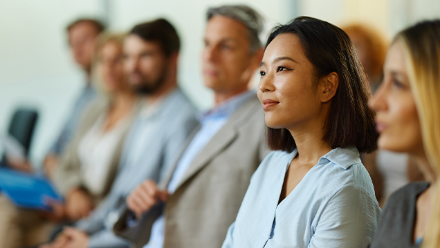 Group of business people attending a seminar