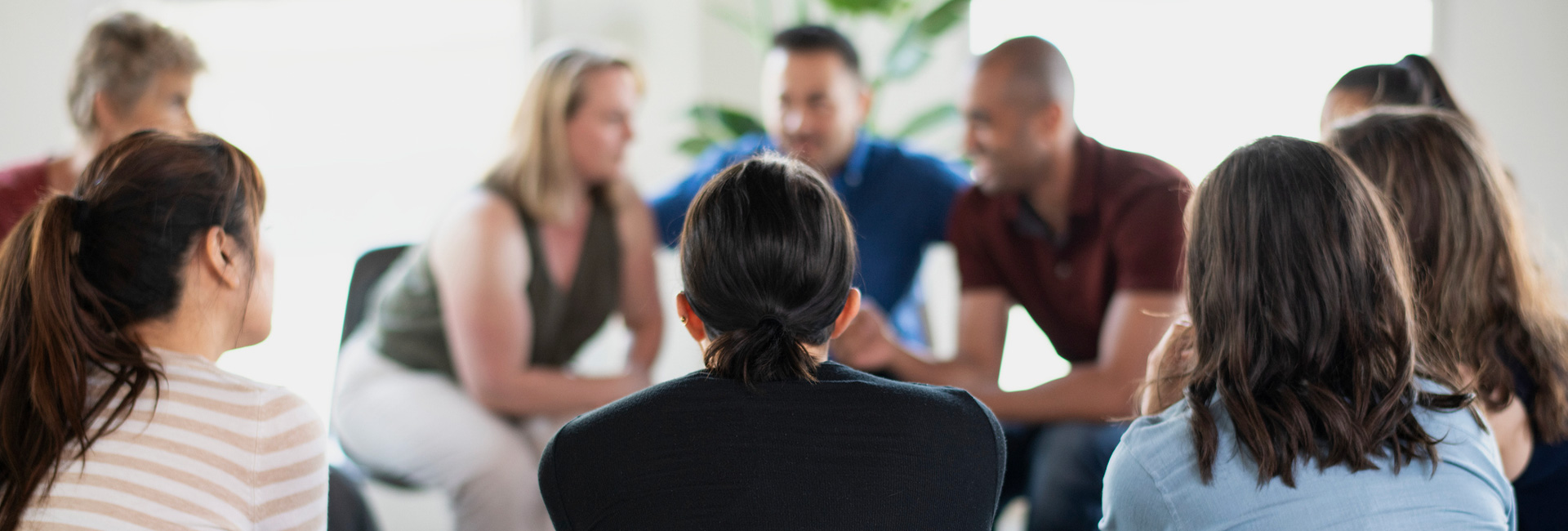 People talking in a support group session