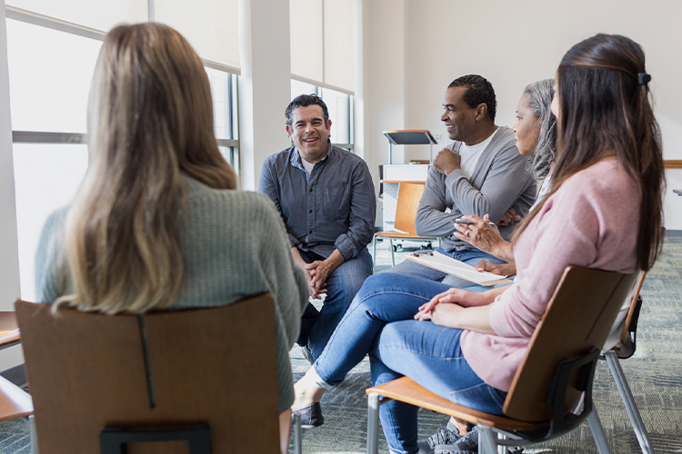 Man talking in a support group meeting