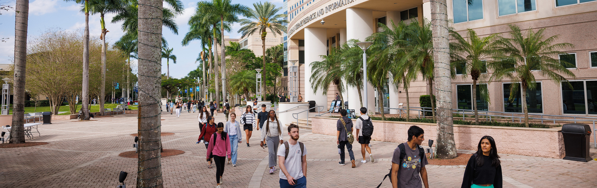 Group of students walking outside of campus