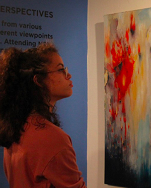 Woman looking at art gallery