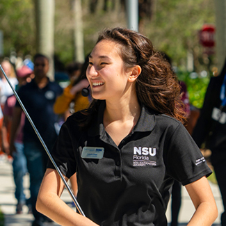 Campus tour person walking around campus