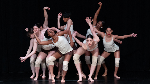 Group of students dancing on stage