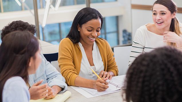 Group of students taking notes during a brainstorming session