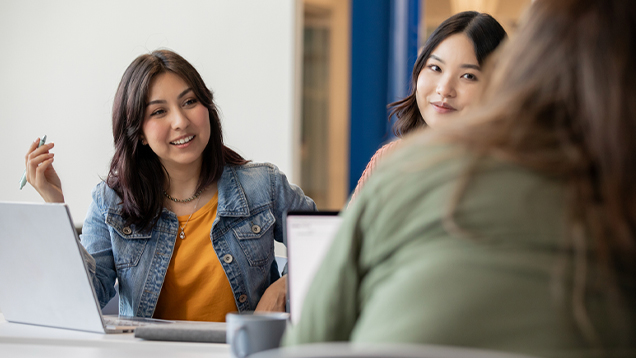 Group of students talking in class