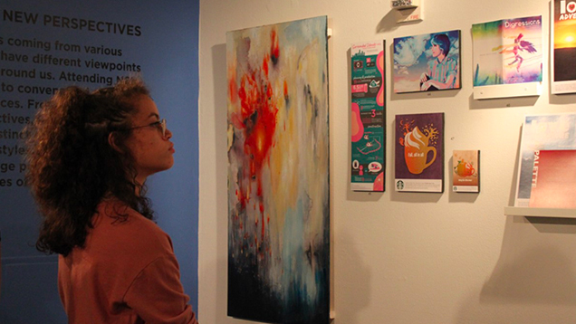 Woman looking at art gallery