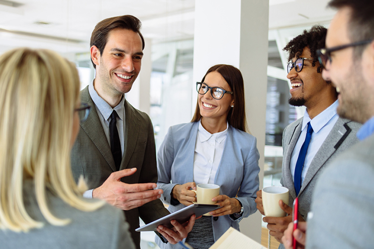 Business people talking in a lobby