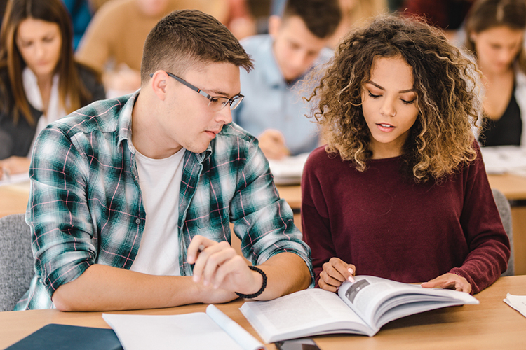 Group of students studying in a classroom