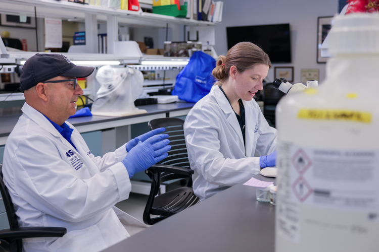 Ocean ecology lab two NSU people working