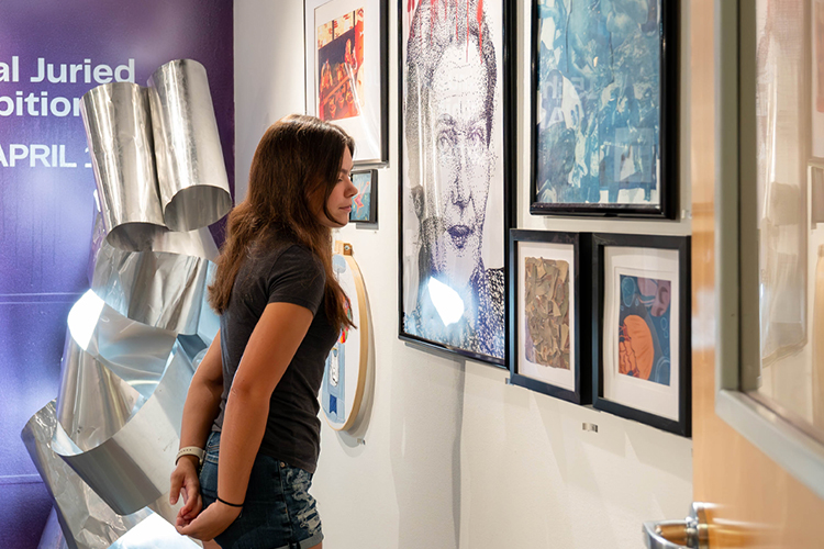 Student in art gallery