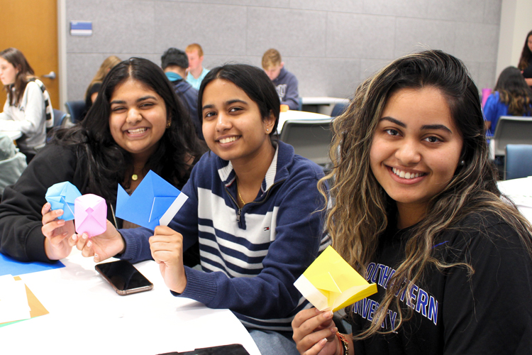 Honors students attend an origami workshop hosted by the Honors College.