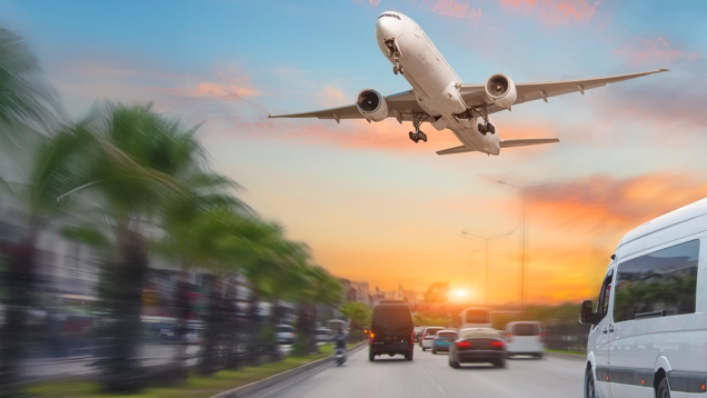 Plane and car traffic with sunset view