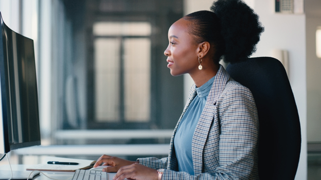 Women reading hr resources on computer