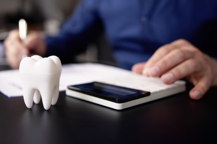 Person working on dental plan