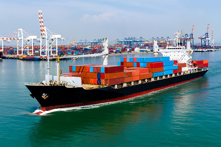 Container ship in the sea near the ports