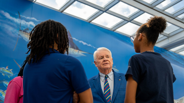 Students and Dr. Moon talking