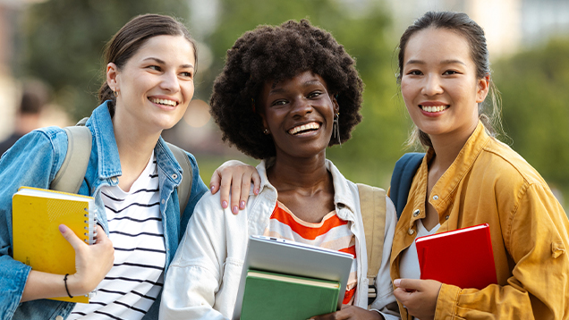 Group of students smiling for the camera