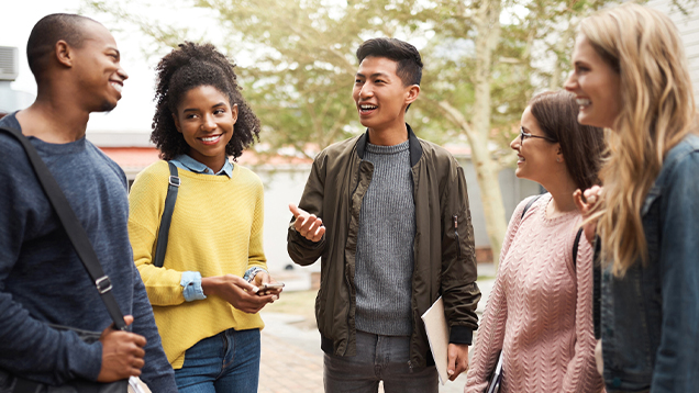 Group of students talking outside
