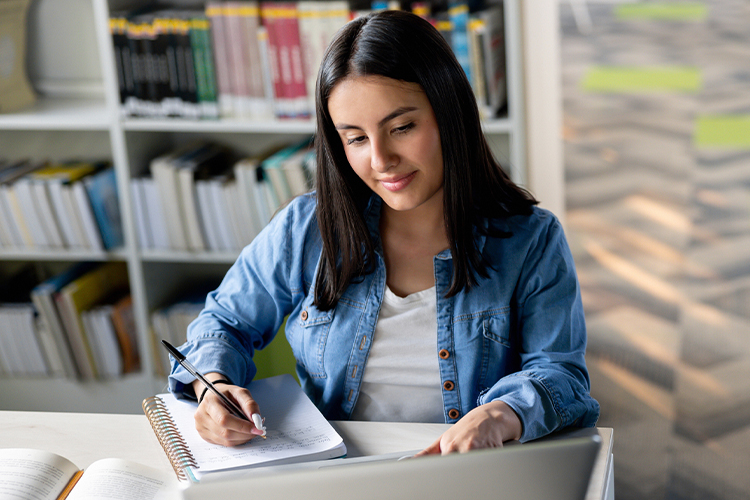 Student studying at the library