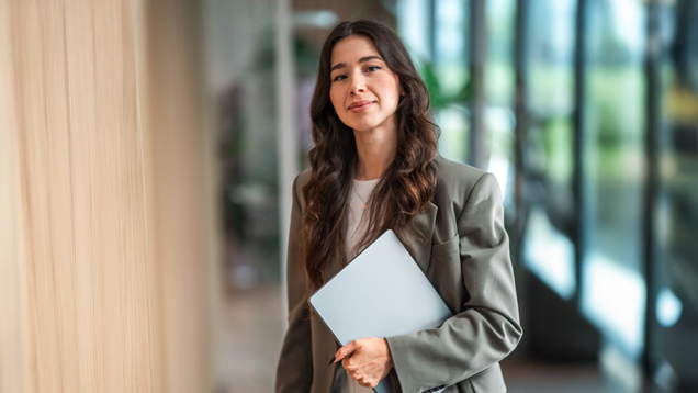 Lawyer holding laptop with employer resources