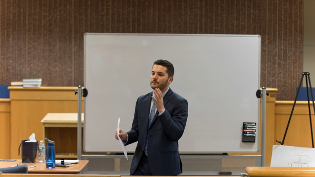 NSU Student presenting in Moot courtroom