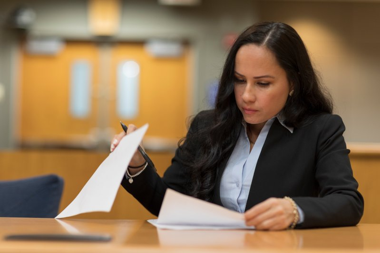 Law student reviewing law exam