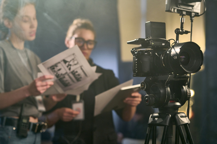 Academic media production camera on stand in studio