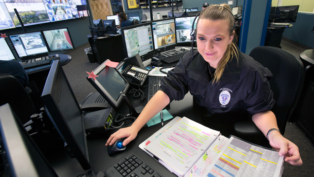 Campus safety lady working in computer