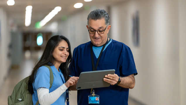 Health NSU professor speaking with student