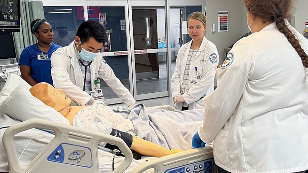 MD students practicing skills at clinical