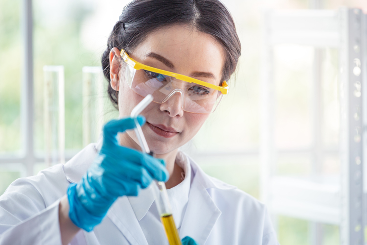 Doctor holding test tube on lab