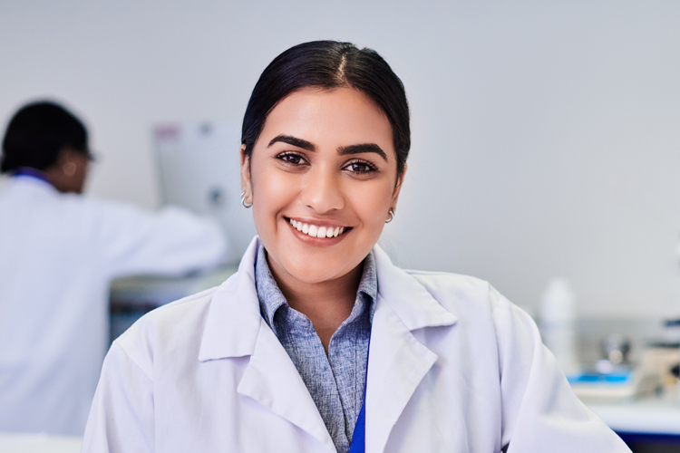 Smiling student with working on the marters degree