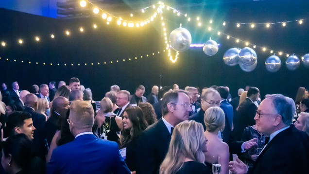 People celebrating at arena event