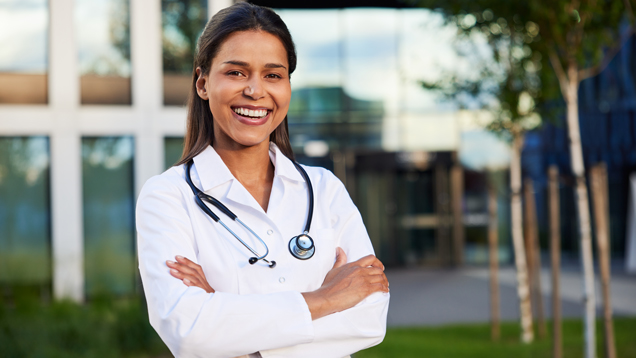 Doctor smiling on outdoors