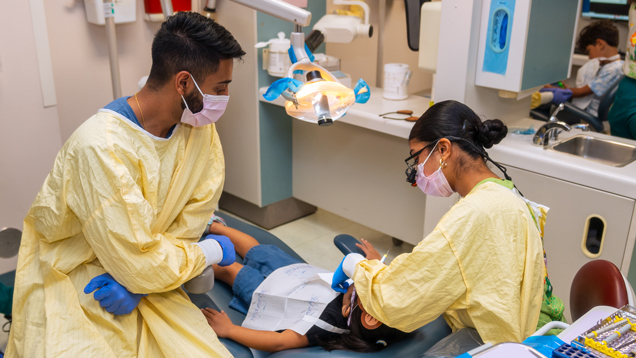 Pediatric dental care NSU professionals cleaning kid teeth