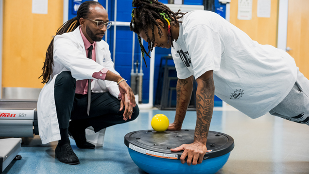 Sports medicine Dr. Joseph with patient